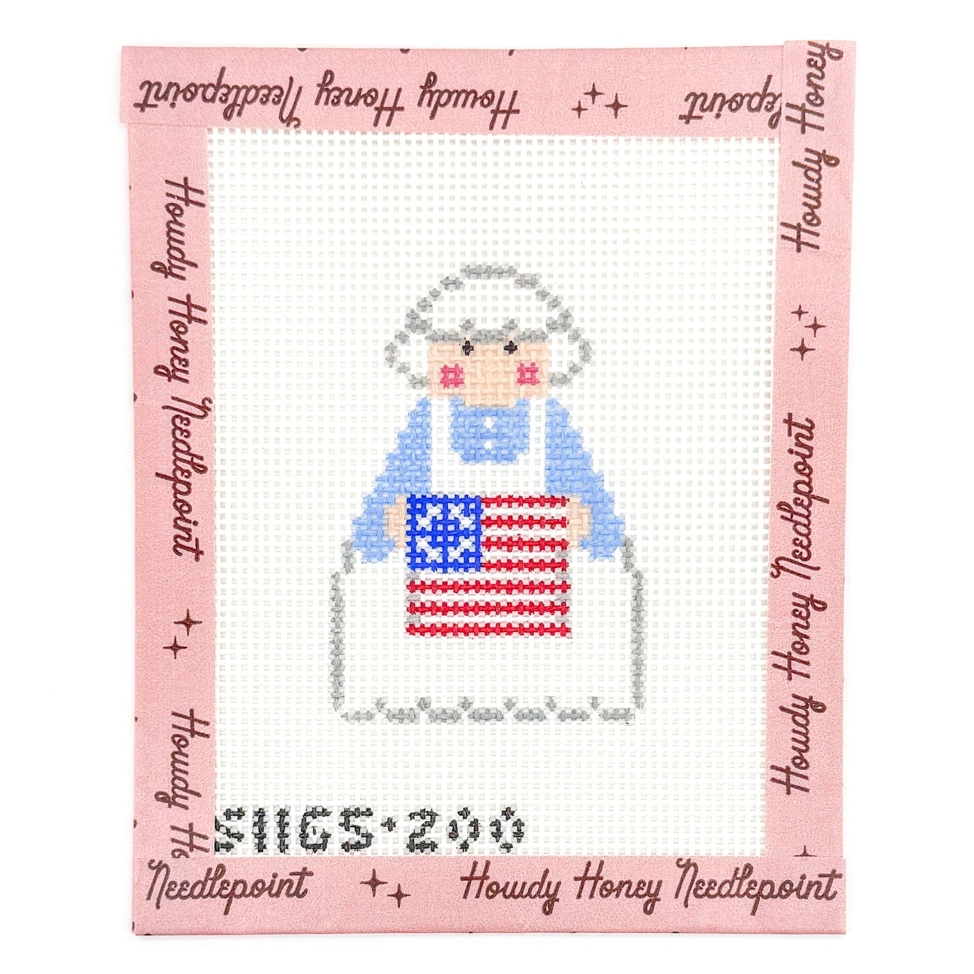 Cross-stitched design of a woman holding an American flag on a pink background with 'Howdy Honey Needlepoint' branding.