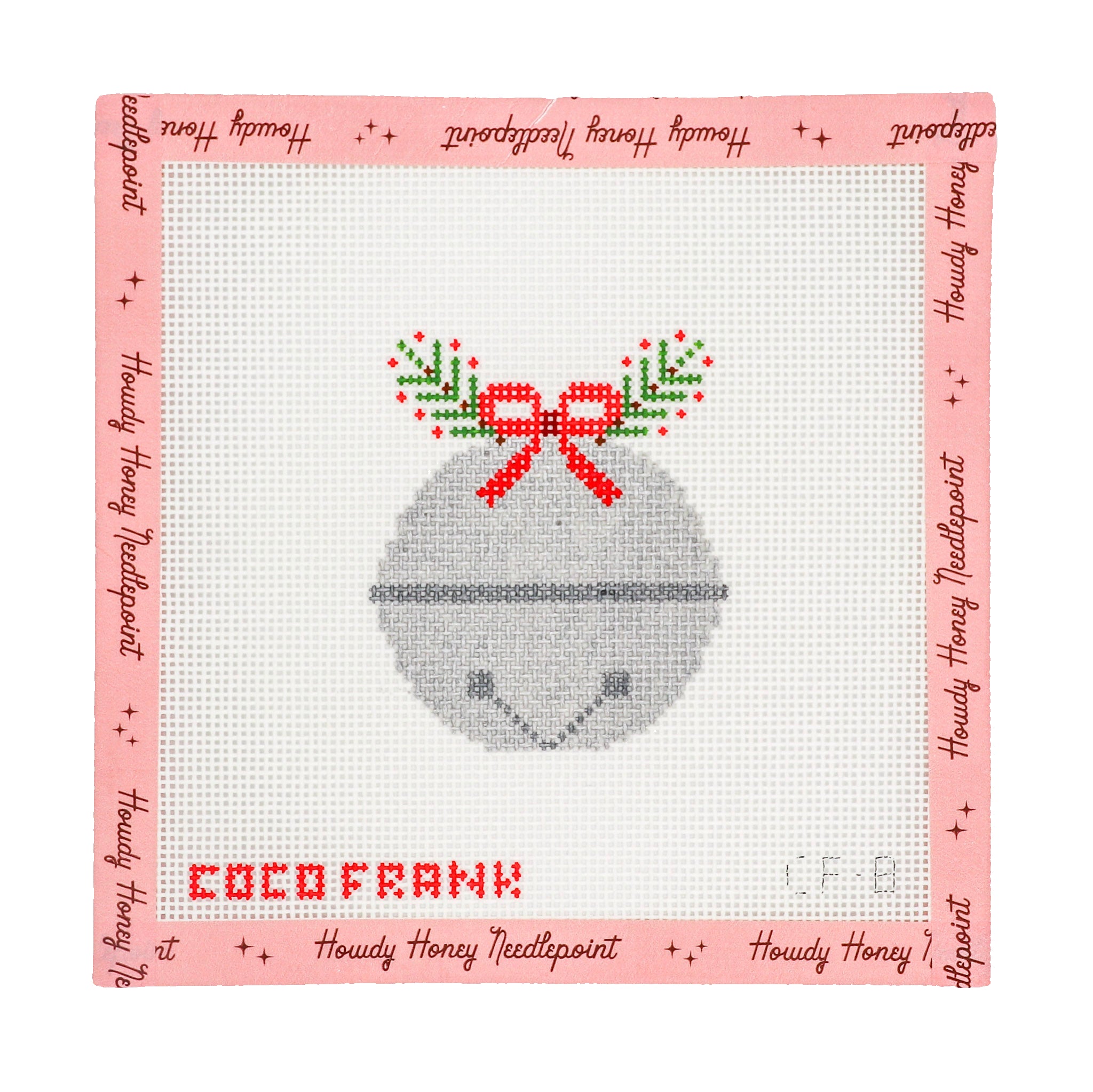 Cross-stitched design of a Christmas ornament with a bow on a pink border with text, featuring the brand 'Howdy Honey Needlepoint'.