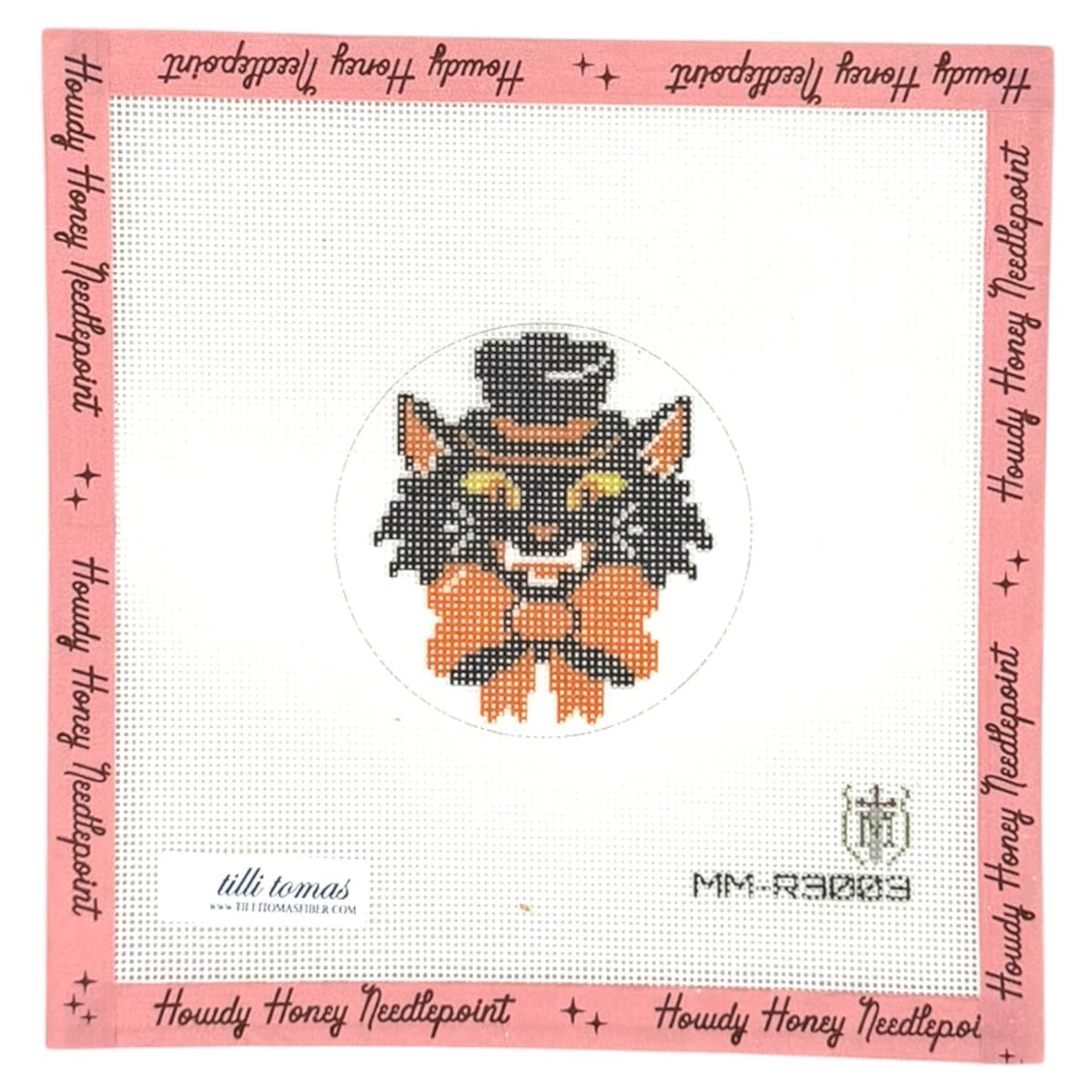 Needlepoint kit with a wolf design on a white background, framed by pink border text.