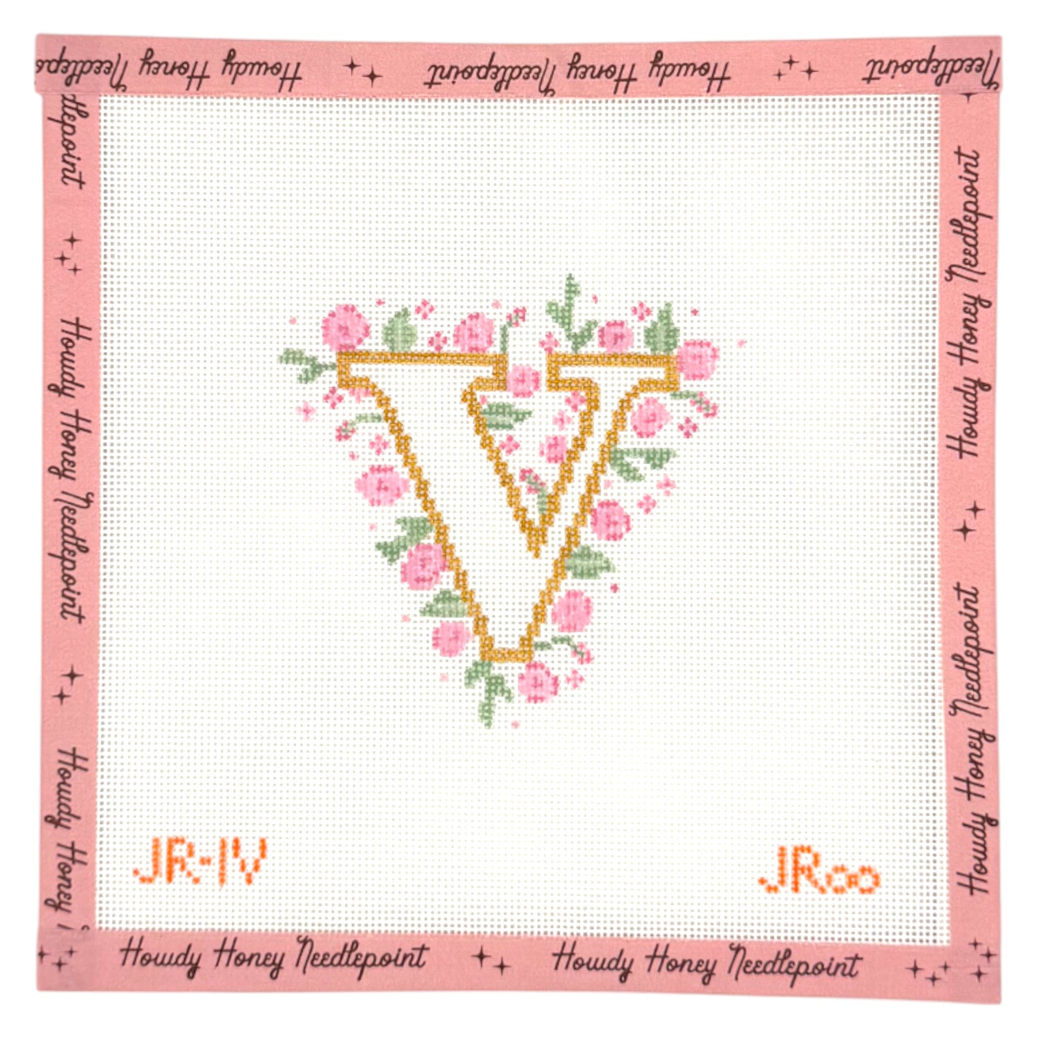 Floral letter 'V' design with pink roses on a white background, framed by text border.