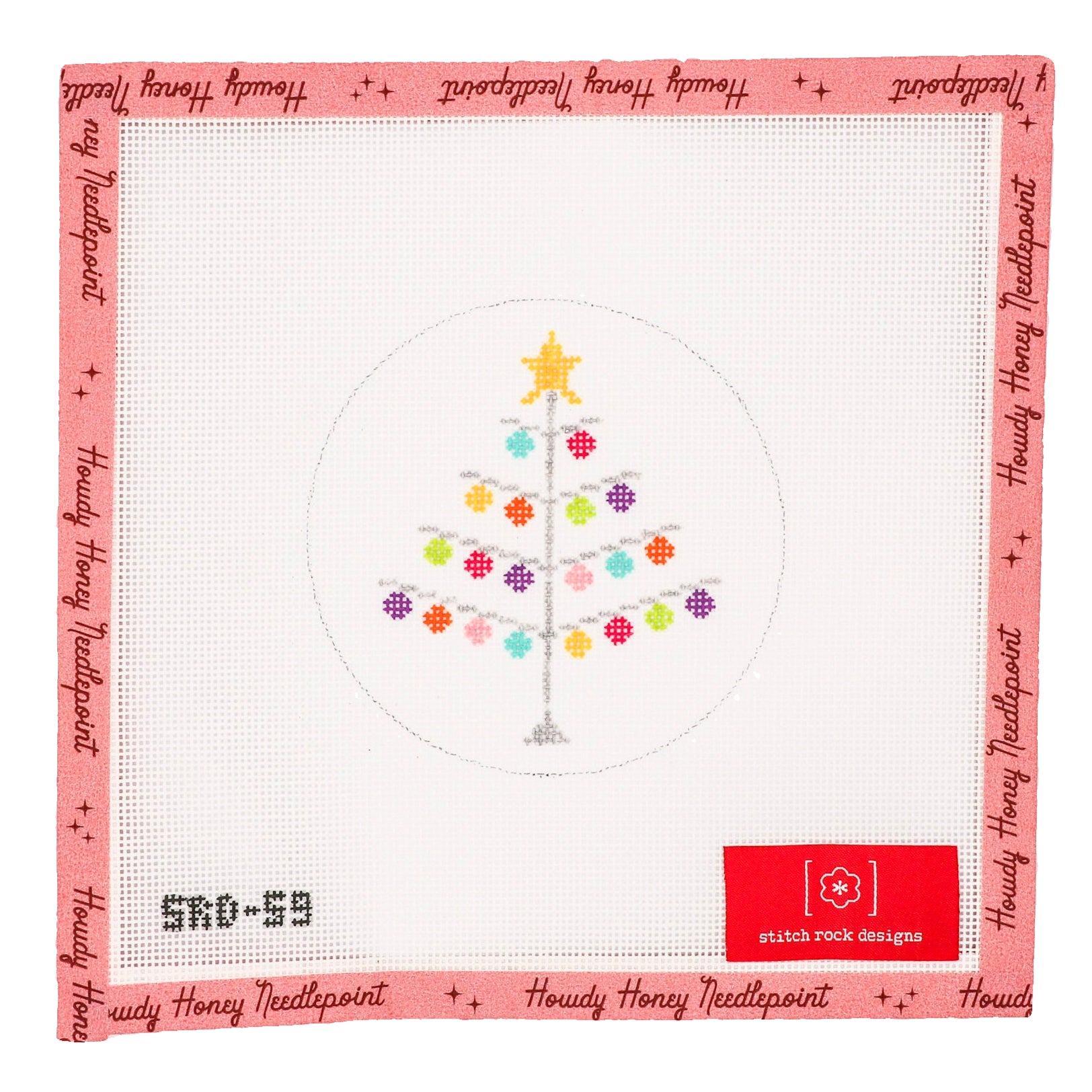 A cross-stitch kit depicting a Christmas tree with colorful ornaments and a star topper on a white background canvas with red borders and text.