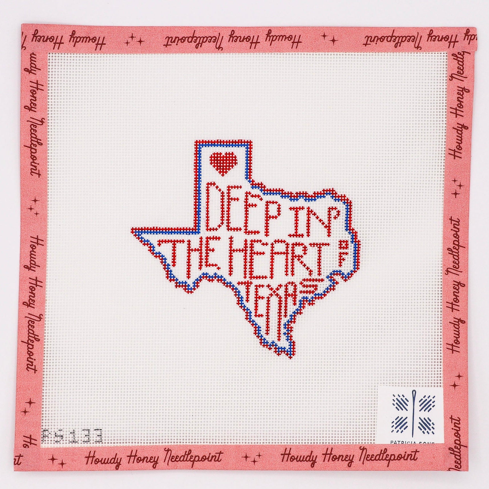 A hand-painted canvas with a 18 mesh design featuring the phrase 'DEEP IN THE HEART OF TEXAS' in a red heart-shaped font, surrounded by a decorative border in pink.