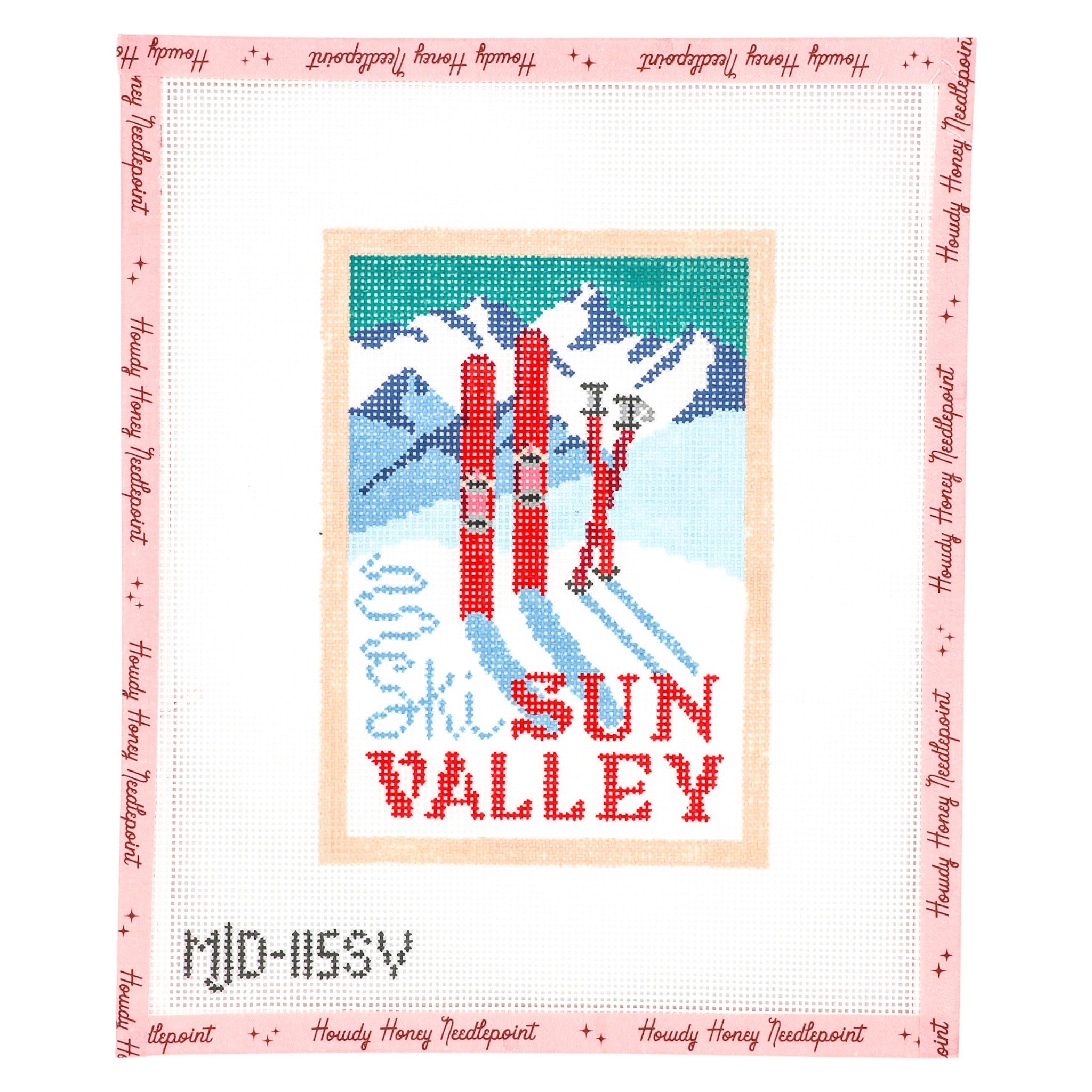 Cross-stitched design of skiers with 'Sun Valley' text on a pink border.