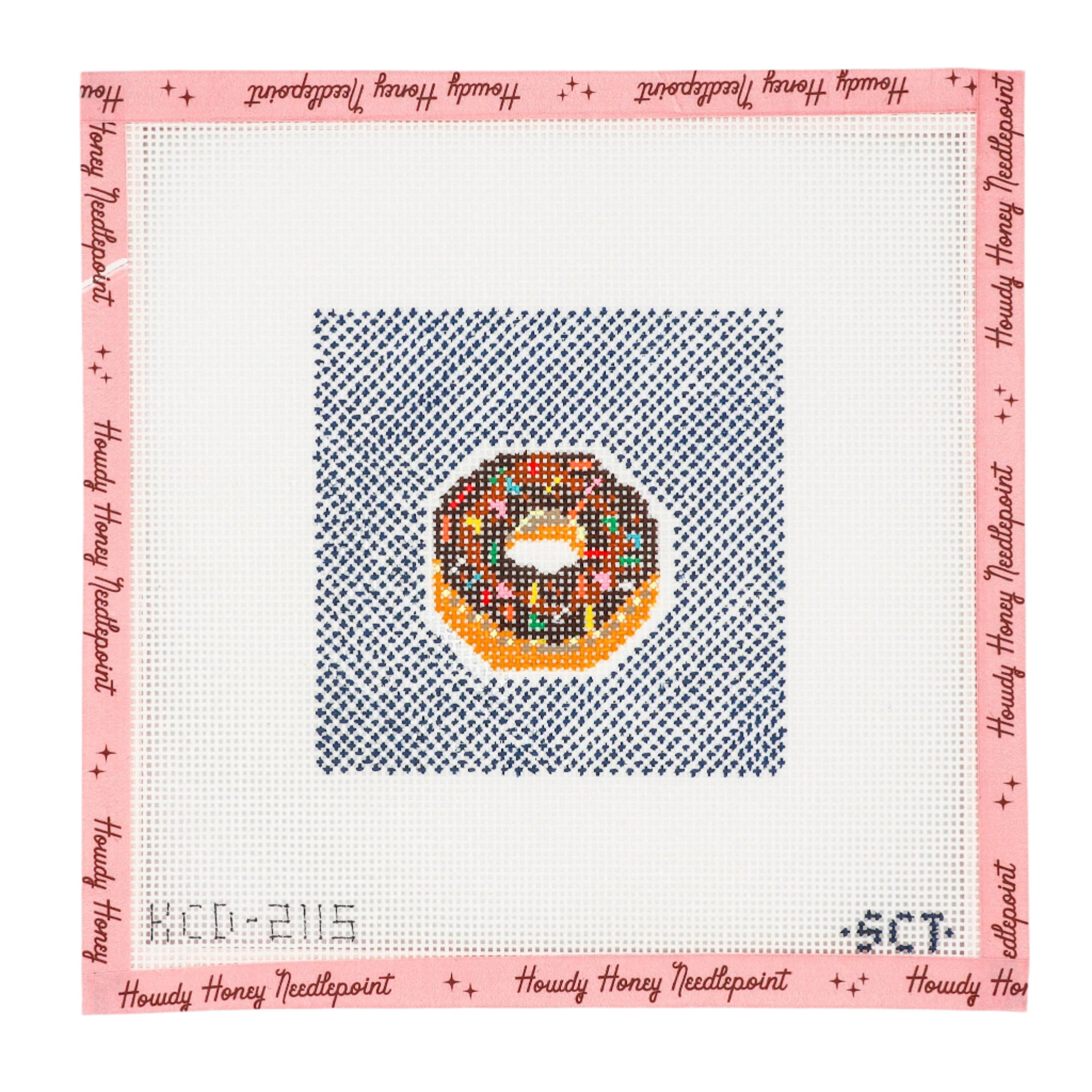 Needlepoint canvas design of donut on fabric with 'Howdy Honey Needlepoint' branding.
