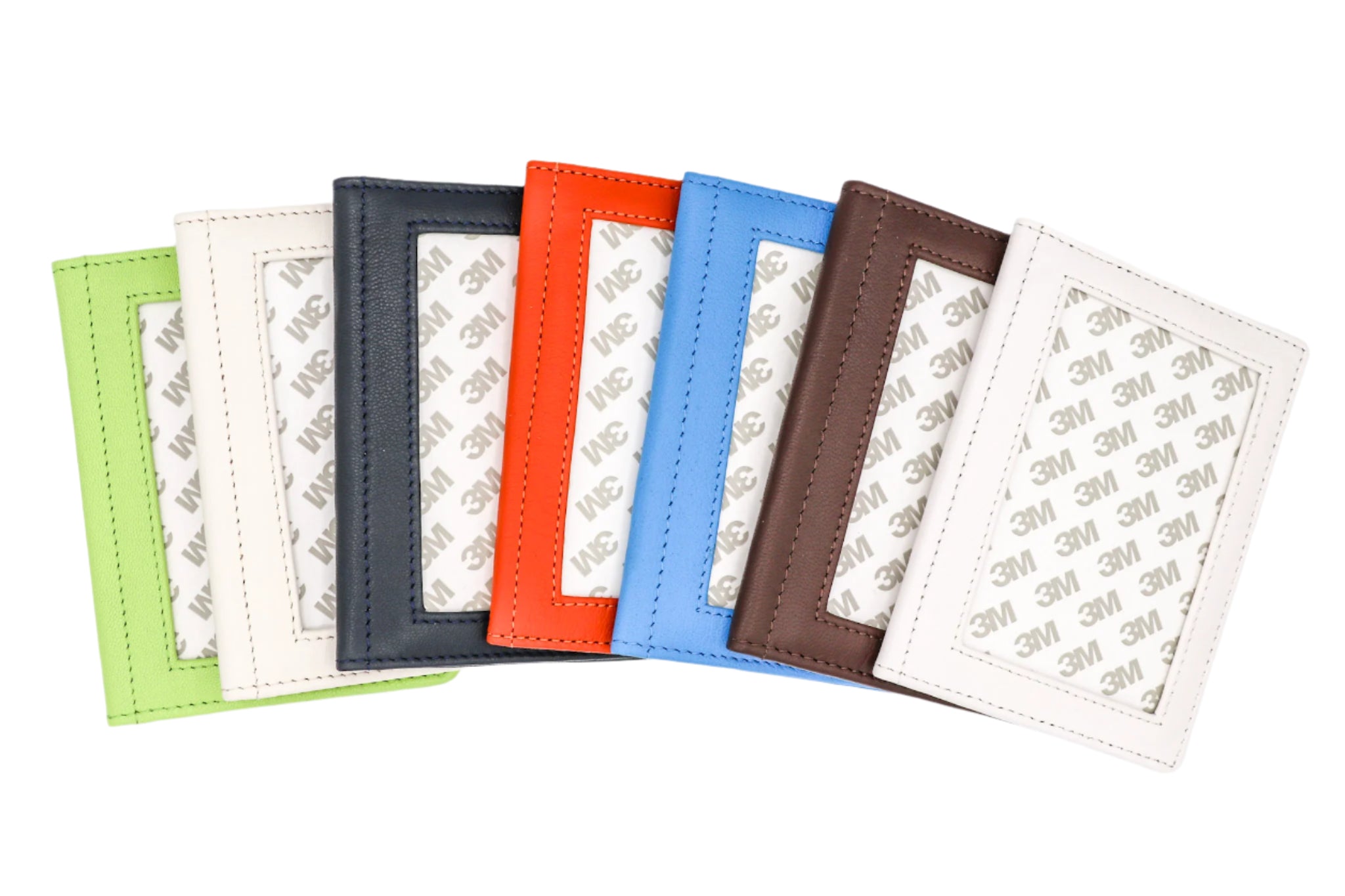 Set of colorful card holders with 3M adhesive backing on a white background