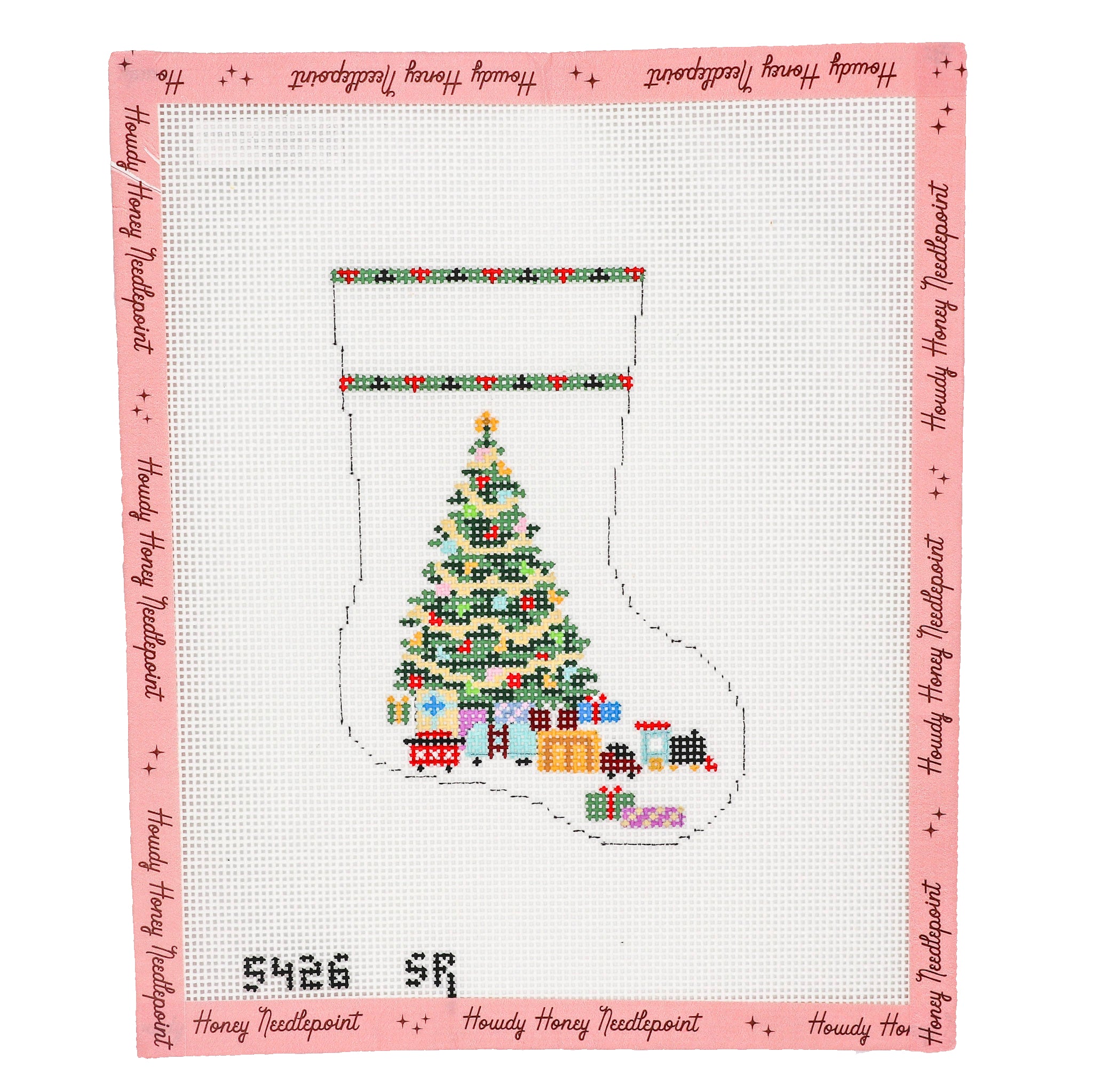 Cross-stitched Christmas stocking with a tree and presents on a pink grid background.