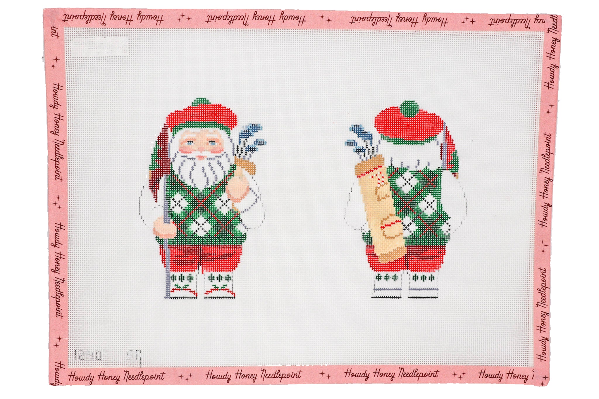Cross-stitched pattern of two characters in festive outfits with a pink border.