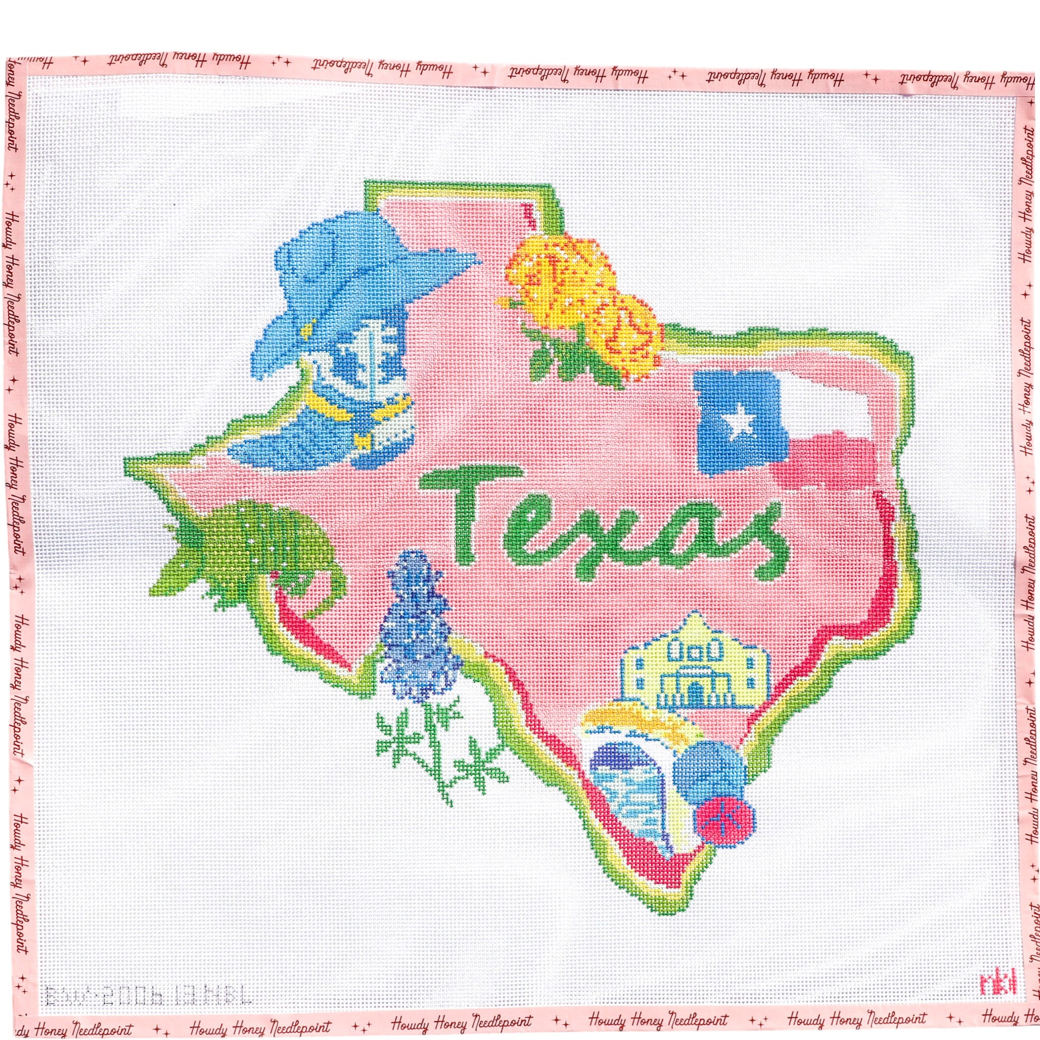 Embroidered map of Texas with various elements on a white background