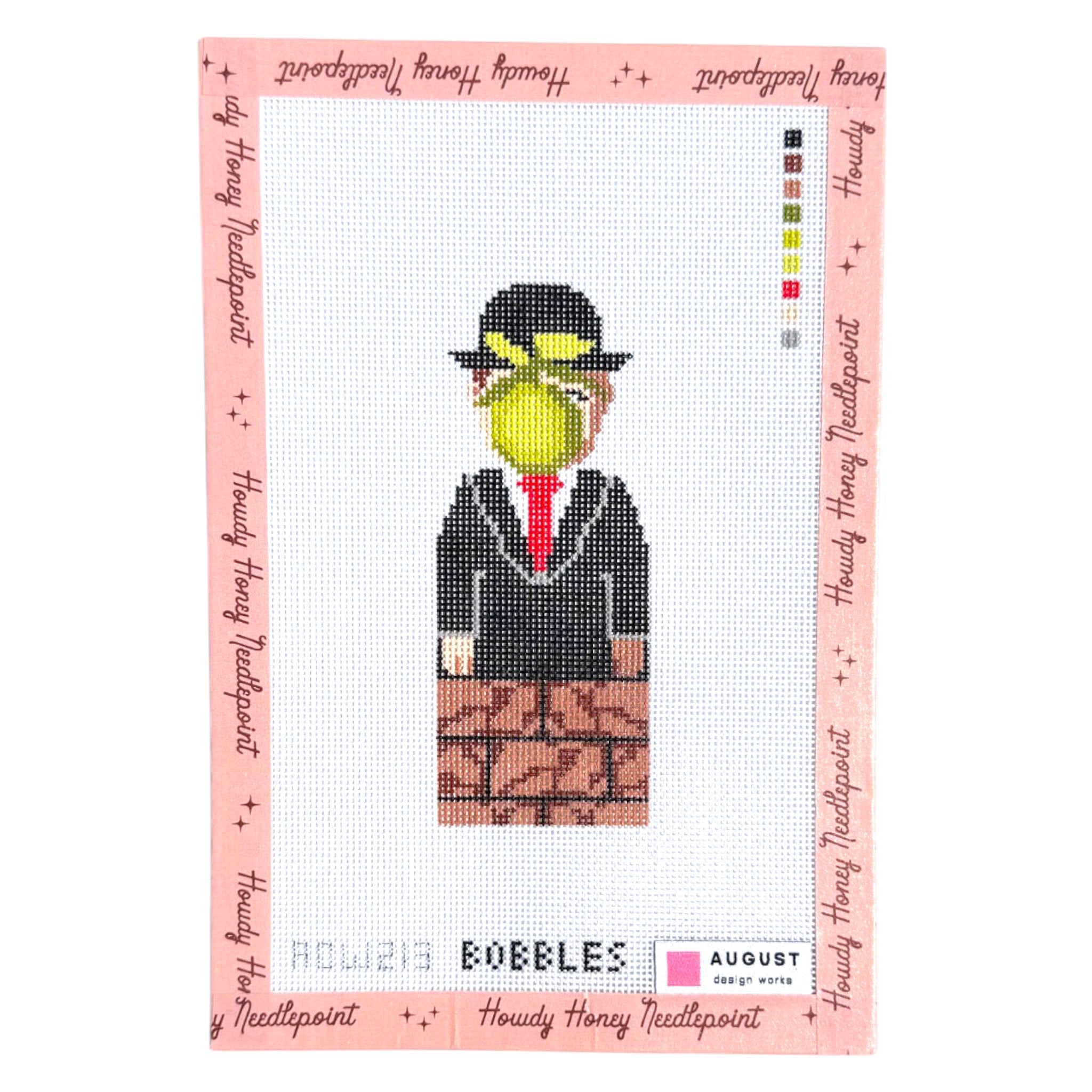 Cross-stitch pattern with a character holding a lemon, framed by text and brand logos.