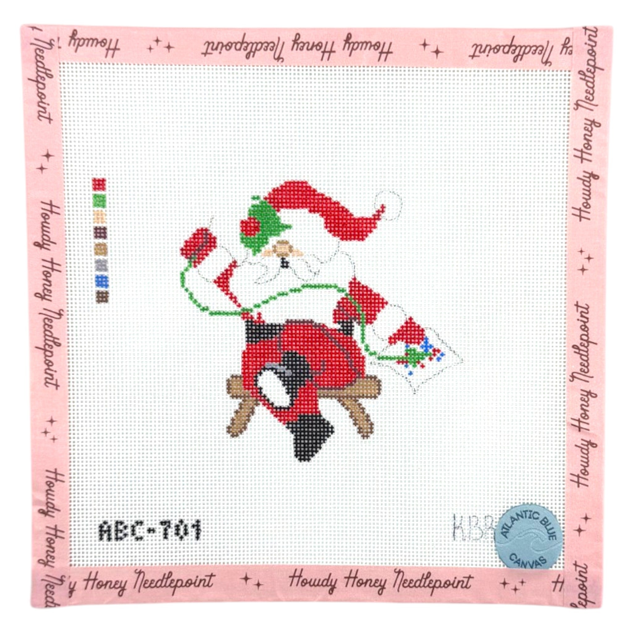 Needlepointing Santa