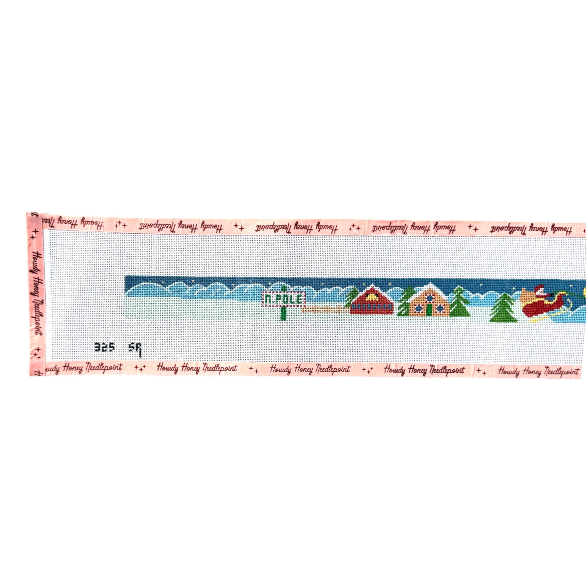 A needlepoint canvas featuring a Christmas landscape with snow, blue sky, houses, trees, and a red sleigh, bordered by pink 'Nancy Henry Toothpout' text.