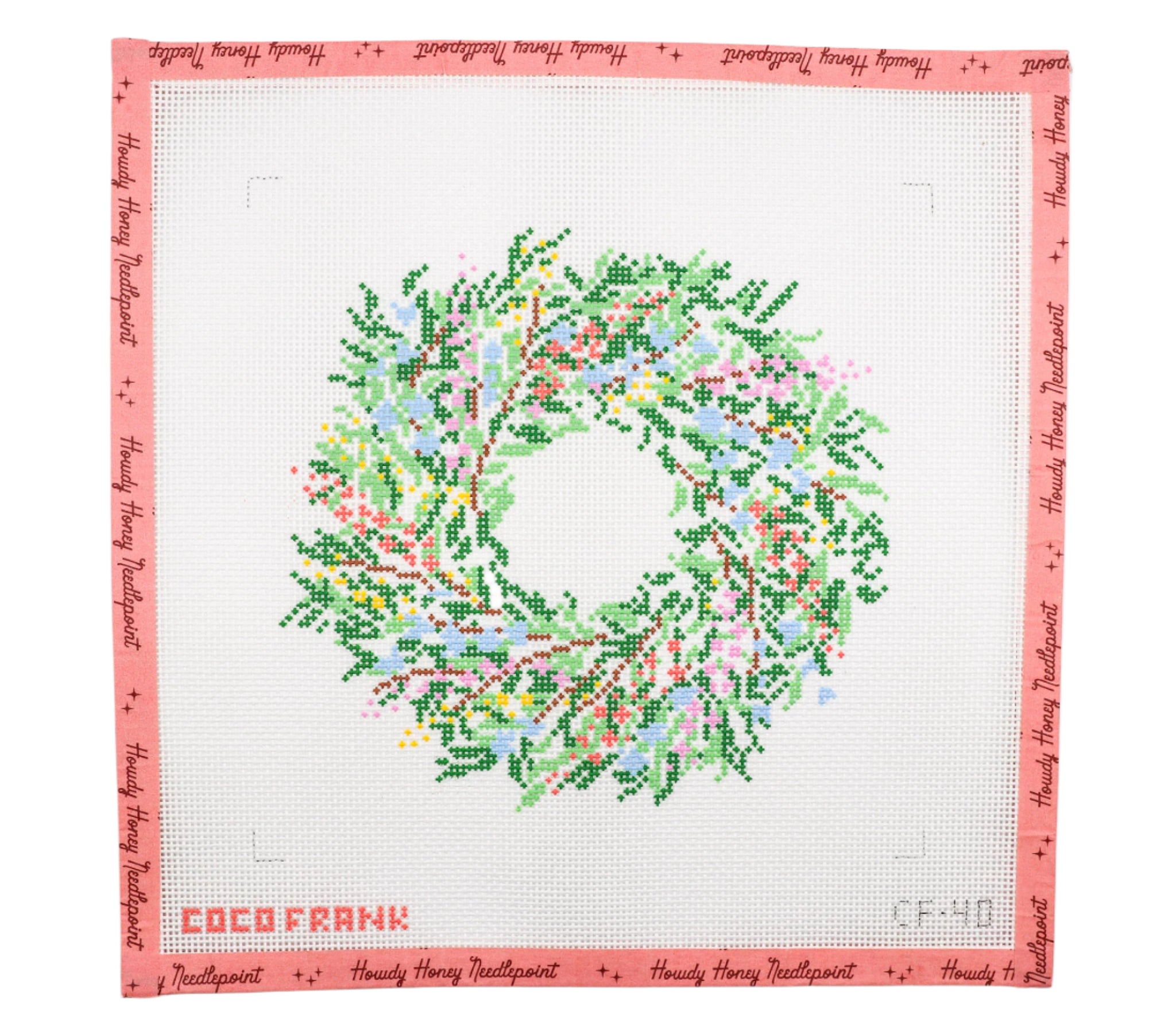 A 13 mesh canvas with a floral wreath design, including tapestry needle, but no fibers are included.