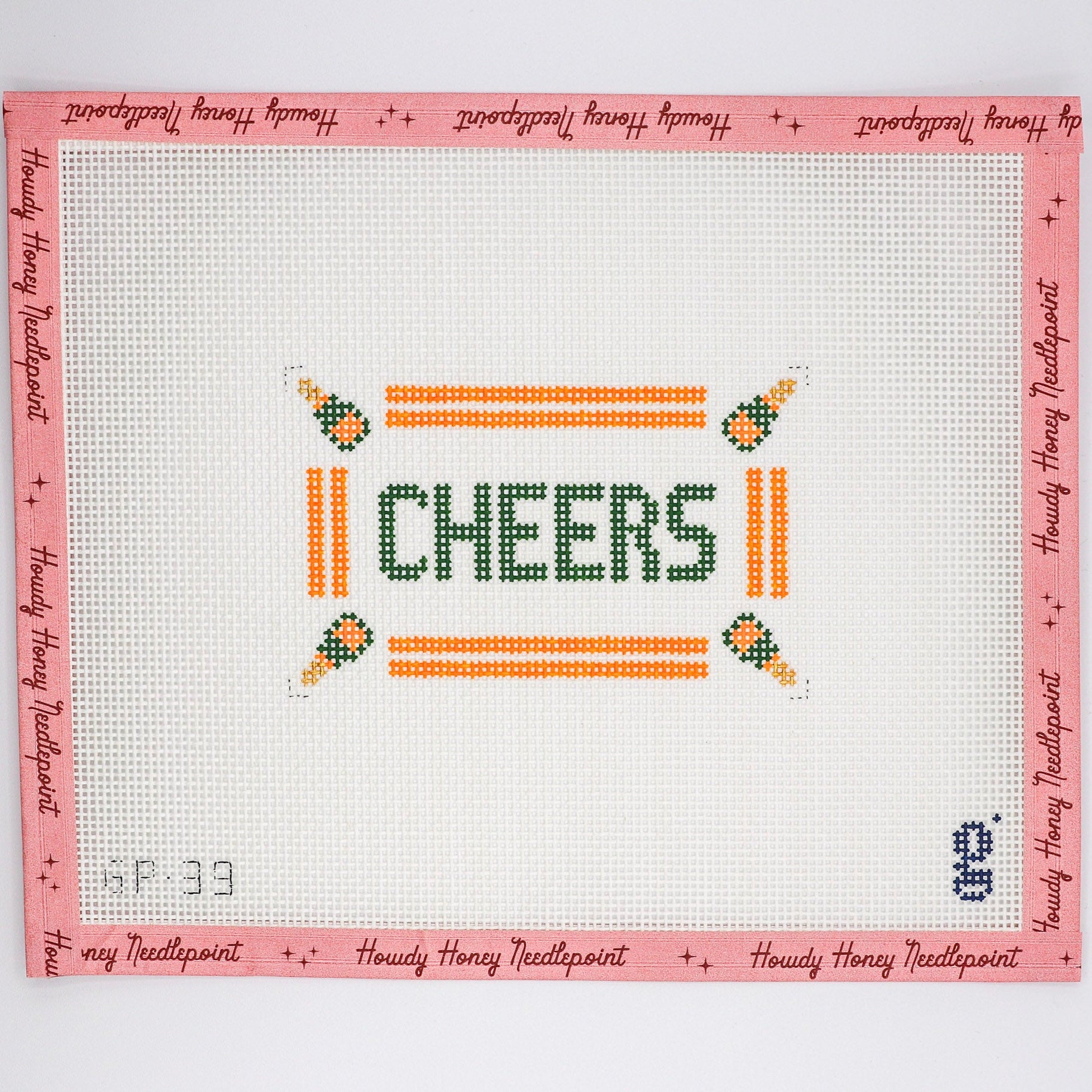 A needlecraft canvas with the word 'CHEERS' and Christmas-themed decorations, primarily in orange and green, on a white background.