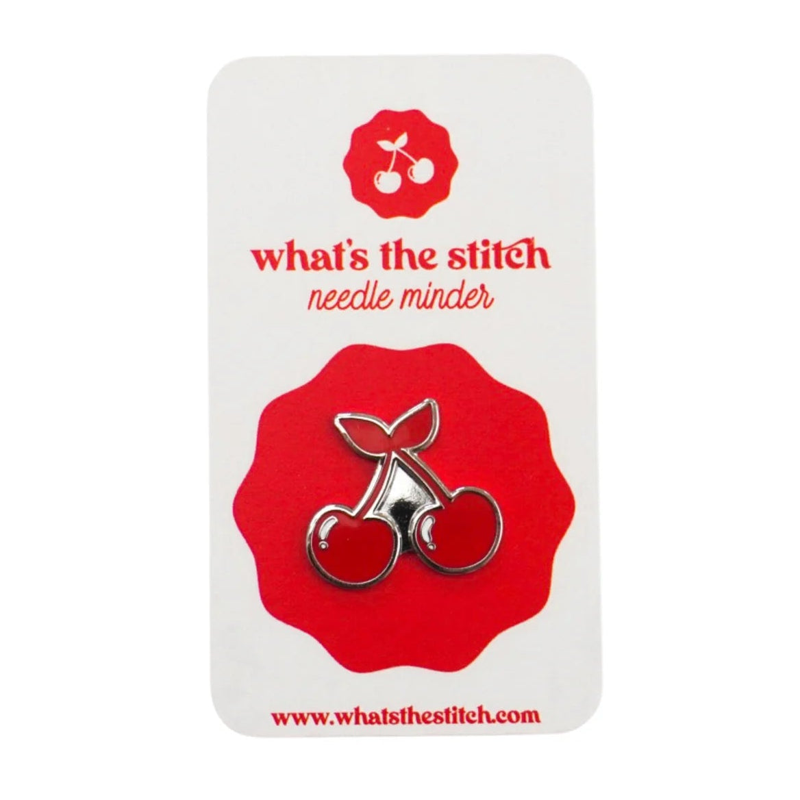 Red and silver needle minder on a white card with 'what's the stitch' branding.